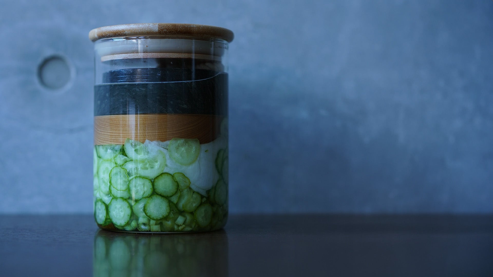 Stone weight pressing vegetables in the jar